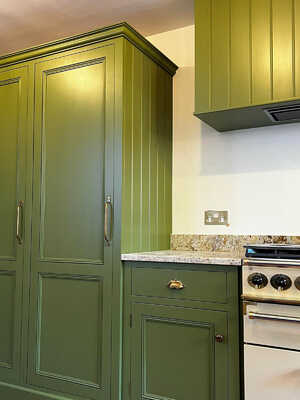 Stunning Green Kitchen with Rustic Details1.jpg