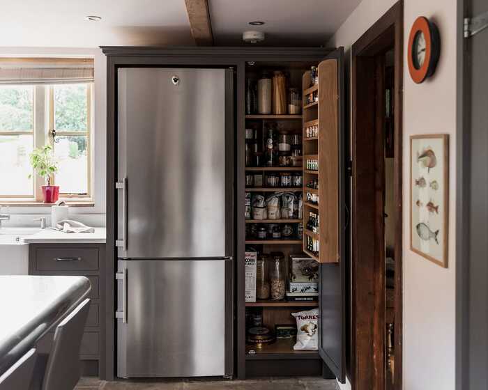 breakfast cupboard next to fridge
