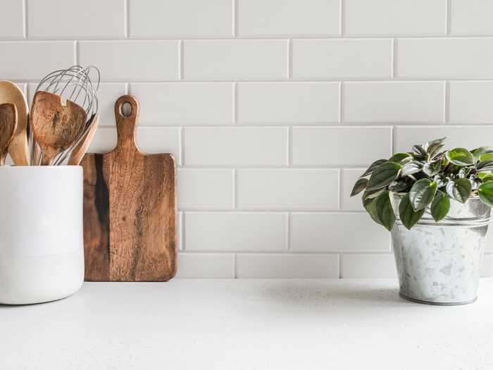 kitchen plant and wooden utensils