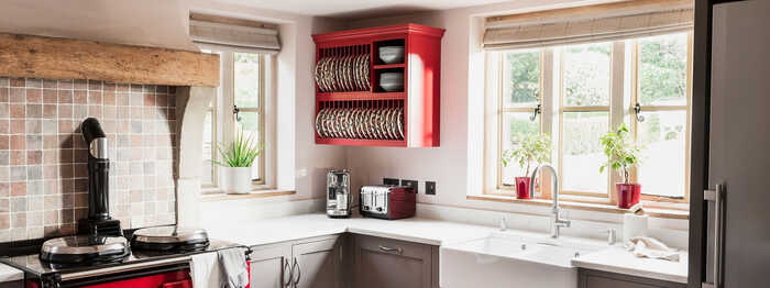modern dark grey and red kitchen